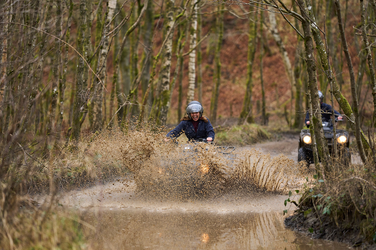 Quad Bikes driving through the estateat Action Glen Quad Bikes driving through the estateat Action Glen